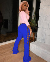 Load image into Gallery viewer, Hot selling solid color eyelet flared trousers